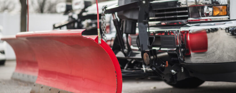 Snow Plow Pickup Trucks Awaiting Winter Season. Commercial Grade Plowers. Transportation Industry Theme.